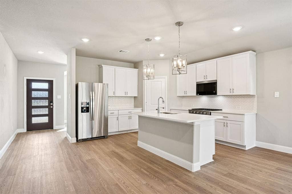 6108 Chickney Drive, Princeton, TX 75071 Photo is not of the actual home, but is an inspirational photo of builder’s model home and may depict options, furnishings, and/or decorator features that are not included.
