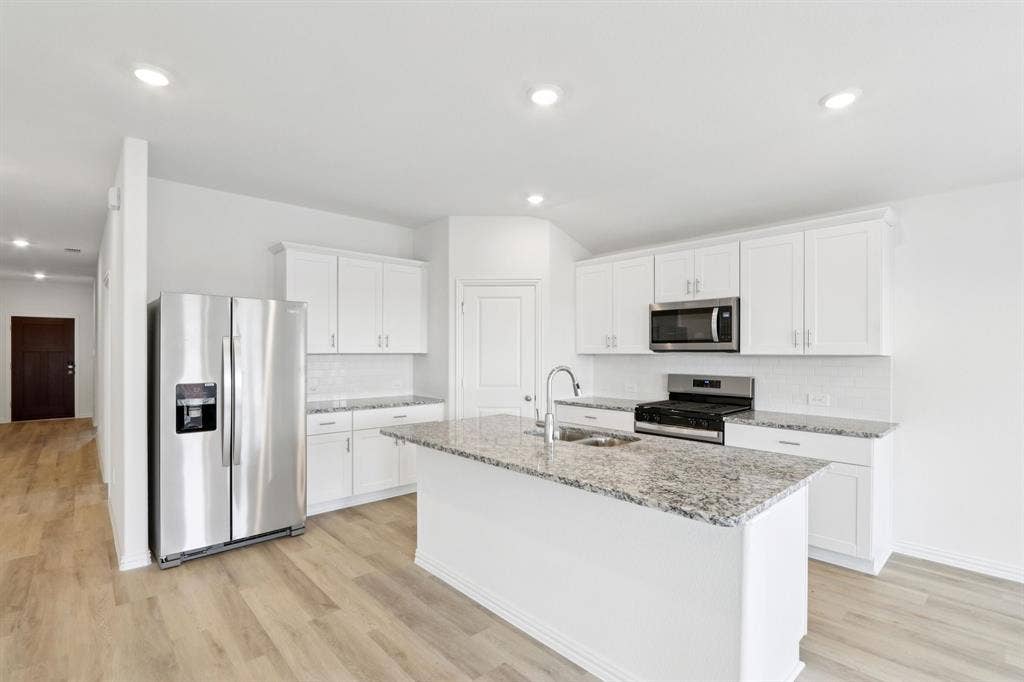 2130 Santa Anita Street, Seagoville, TX 75159 Photo is not of the actual home, but is an inspirational photo of builder’s model home and may depict options, furnishings, and/or decorator features that are not included.