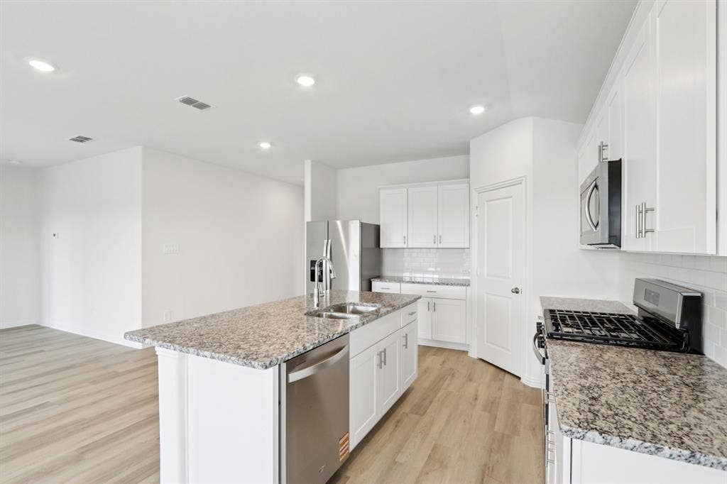 2130 Santa Anita Street, Seagoville, TX 75159 Photo is not of the actual home, but is an inspirational photo of builder’s model home and may depict options, furnishings, and/or decorator features that are not included.