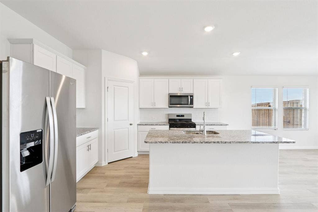 2130 Santa Anita Street, Seagoville, TX 75159 Photo is not of the actual home, but is an inspirational photo of builder’s model home and may depict options, furnishings, and/or decorator features that are not included.