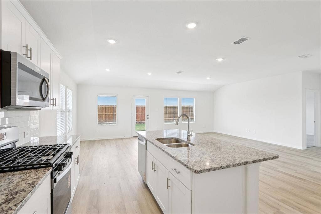 2130 Santa Anita Street, Seagoville, TX 75159 Photo is not of the actual home, but is an inspirational photo of builder’s model home and may depict options, furnishings, and/or decorator features that are not included.