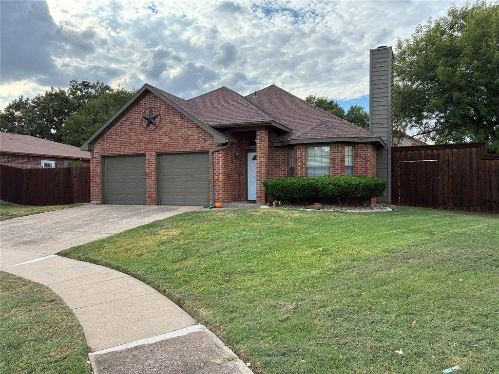 2062 Bronco Lane, Keller, TX 76248 Brick exterior with a two-car garage