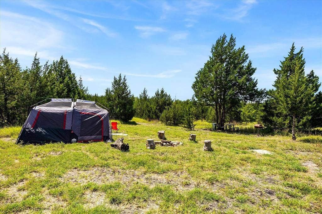 976 Fm 2194, Farmersville, TX 75442 Primitive tent camping site with picnic table, grill and fire circle.
