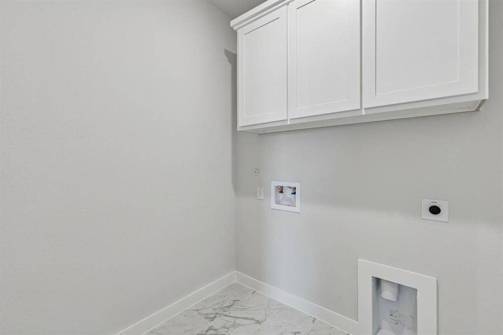 4704 Starlight Drive, McKinney, TX 75071 Utility Room in the Stanley II home plan by Trophy Signature Homes – REPRESENTATIVE PHOTO