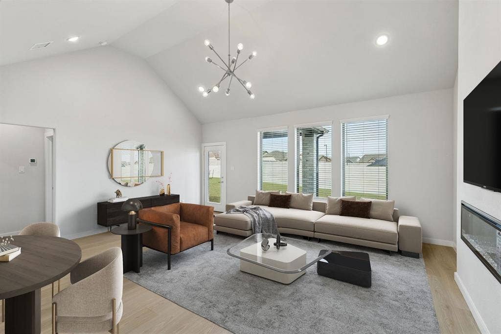 4704 Starlight Drive, McKinney, TX 75071 Dining and Living Room in the Stanley II home plan by Trophy Signature Homes – REPRESENTATIVE PHO