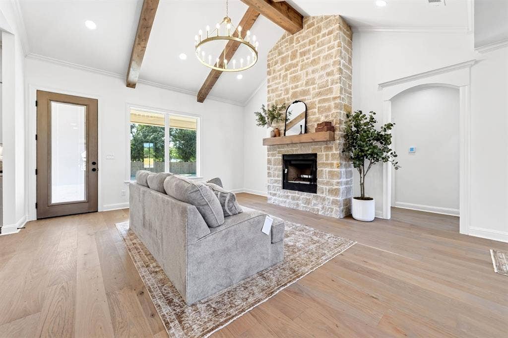 Cozy & inviting living room, ready to be enjoyed for generations ti come. (View of hallway to 2nd & 3rd room + guest bathroom)