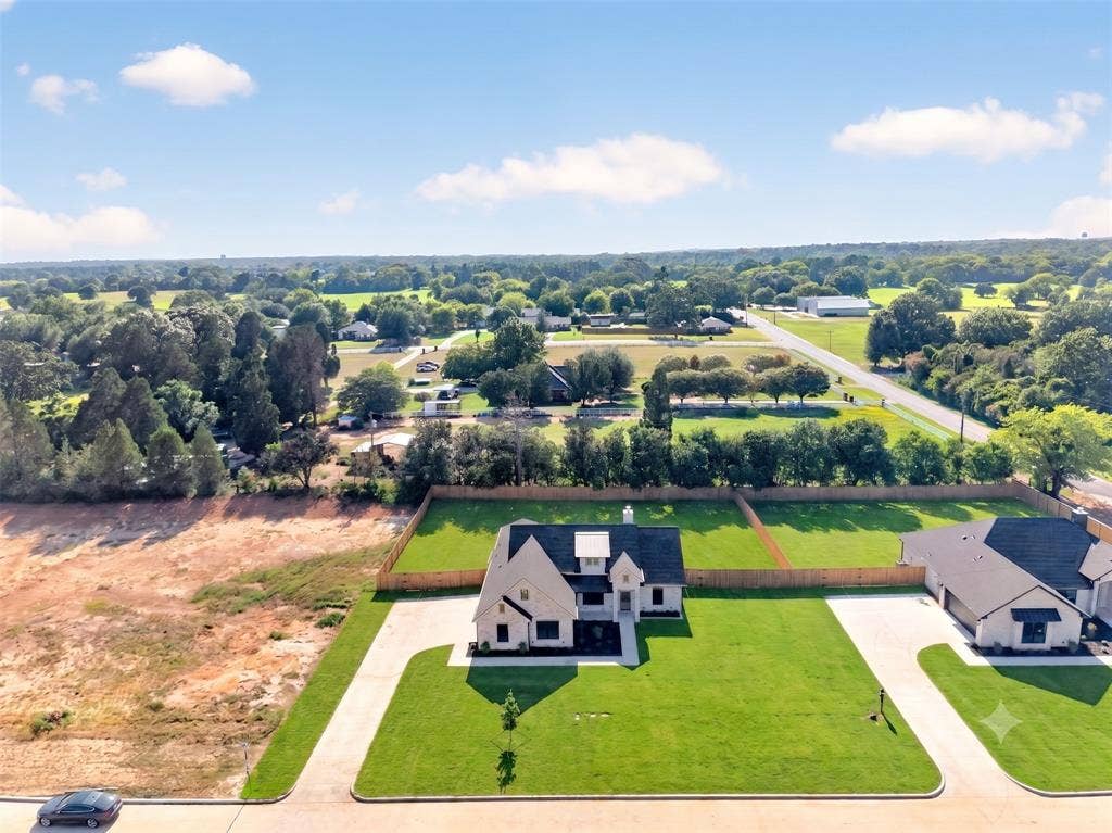 Located in Athens’ newest community, Fullingim’s Grace Haven, welcome to 306 Grace Lane. This thoughtfully designed new construction home offers a highly desirable floor plan situated on a spacious 0.50-acre lot, with plenty of room to add a pool or site-built shop. Grace Haven offers no HOA, PID/MUD tax, or city tax and is lightly deed restricted to help maintain the community’s cleanliness and long-term value.