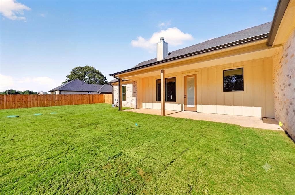 Large 6' privacy-fenced backyard with seamless aluminum gutters, french drains, double gates for easy lawn equipment access & irrigation allows for more less time maintaining your lawn & more time doing what you love.