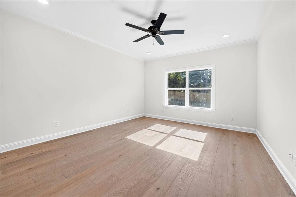 Across the split floor plan, the 2nd bedroom offers natural lighting & a spacious closet for storage.