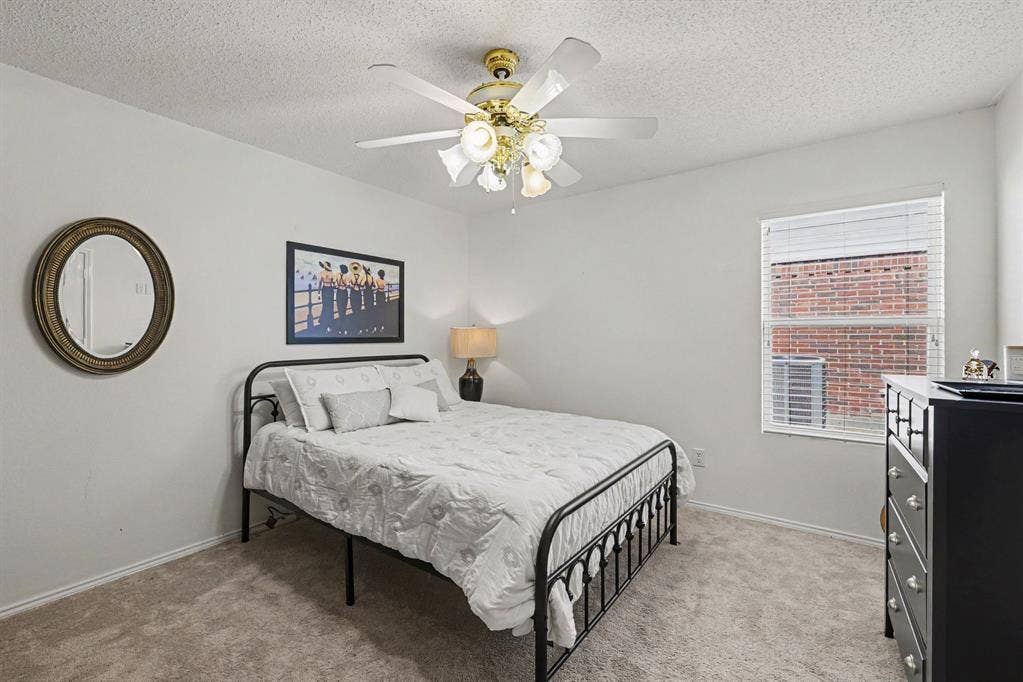 3123 Melrose Drive, McKinney, TX 75070 Guest bedroom with ceilng fan