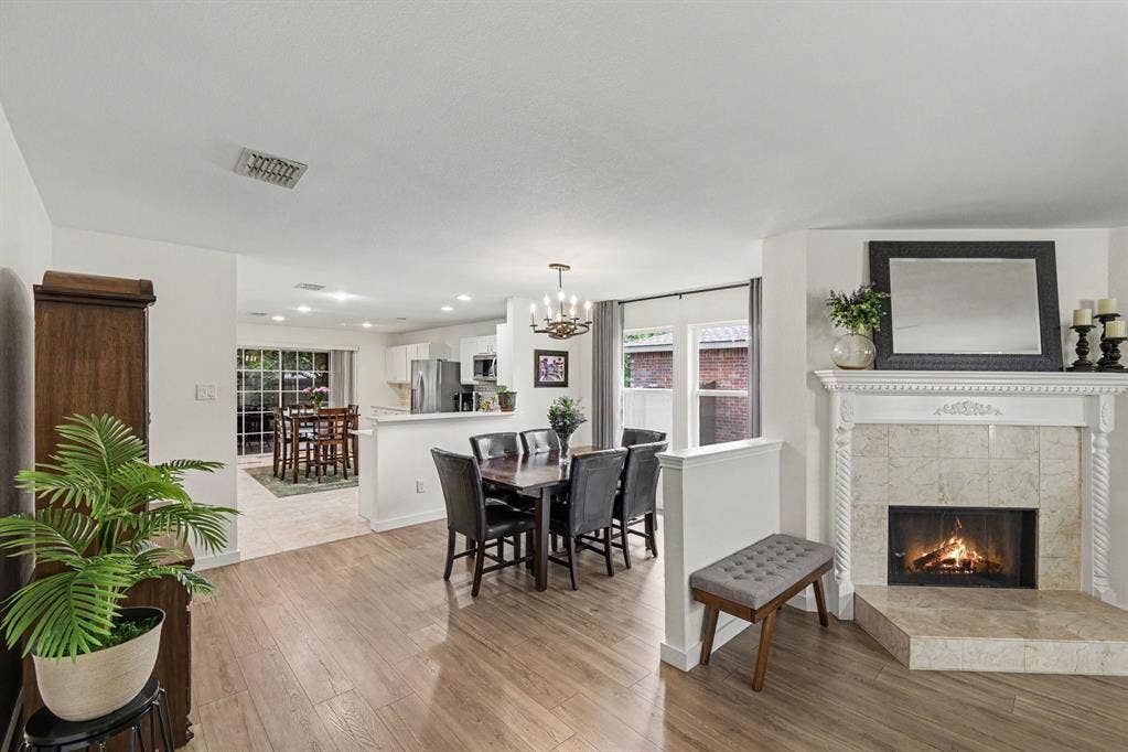 3123 Melrose Drive, McKinney, TX 75070 Dining room with chandelier
