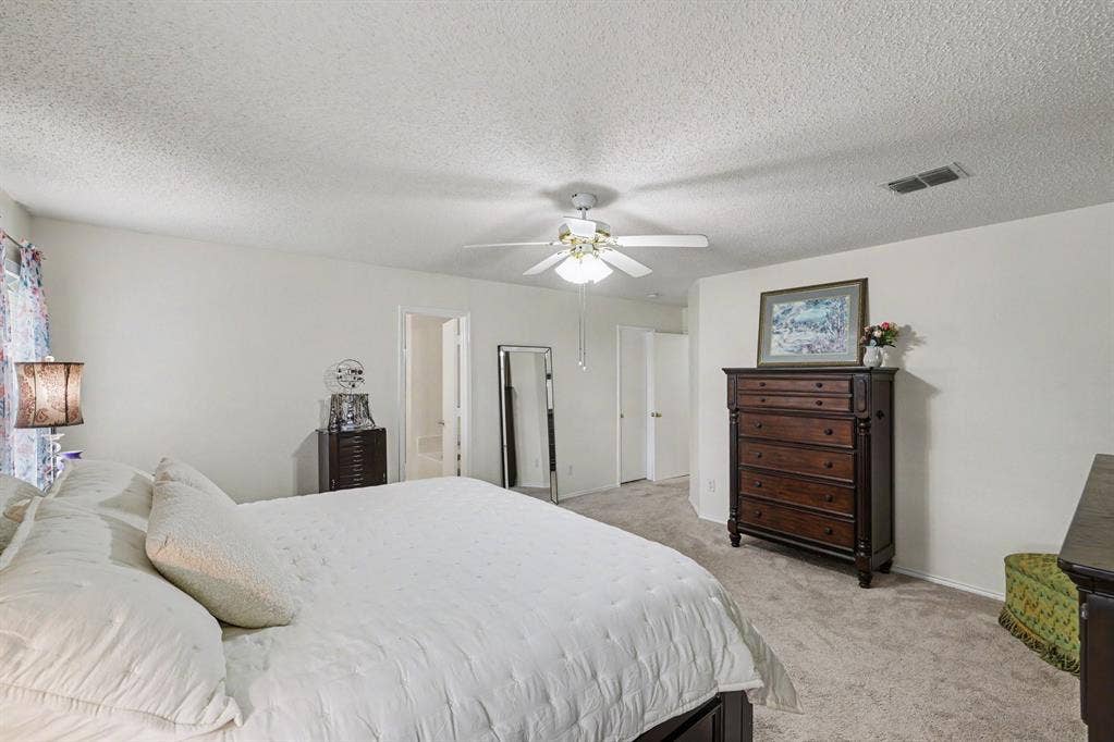 3123 Melrose Drive, McKinney, TX 75070 Primary bedroom with ensuite bath and walk-in closet