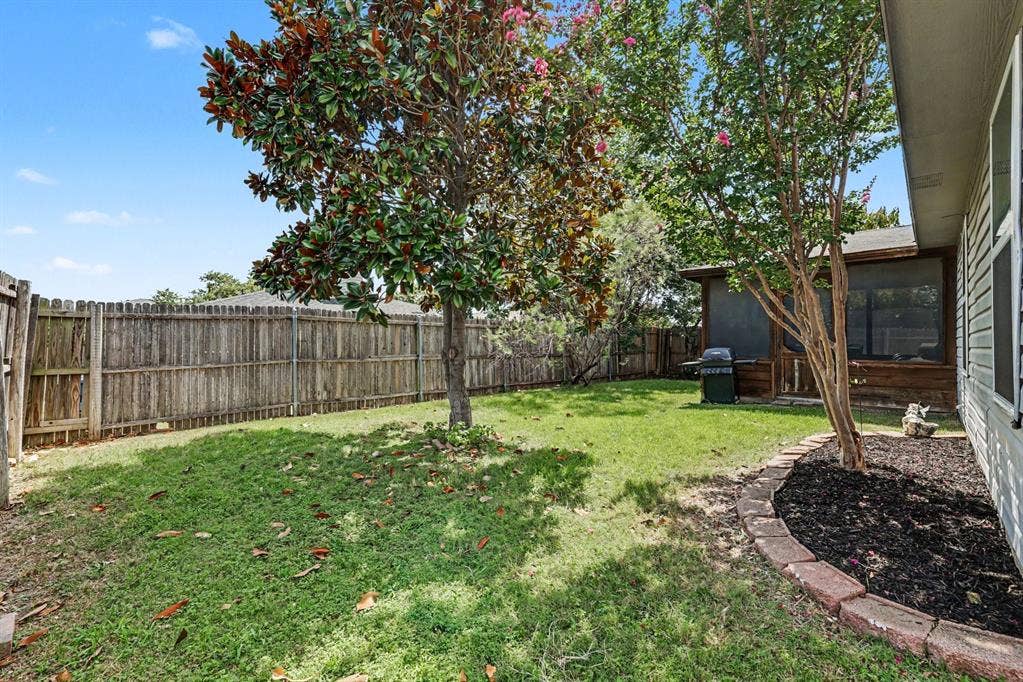 3123 Melrose Drive, McKinney, TX 75070 Beautiful magnolia tree in backyard and large planting area
