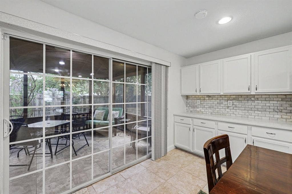 3123 Melrose Drive, McKinney, TX 75070 Large sliding door to enclosed patio