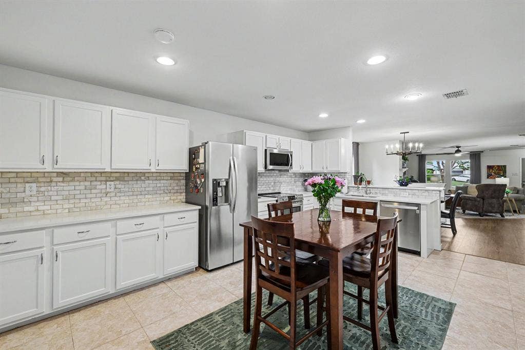 3123 Melrose Drive, McKinney, TX 75070 Lots of storage, open to dining room and living room