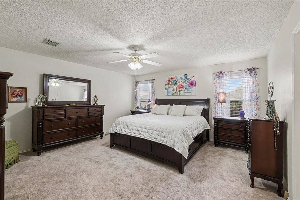 3123 Melrose Drive, McKinney, TX 75070 Primary bedroom has room for siting area, ceiling fan