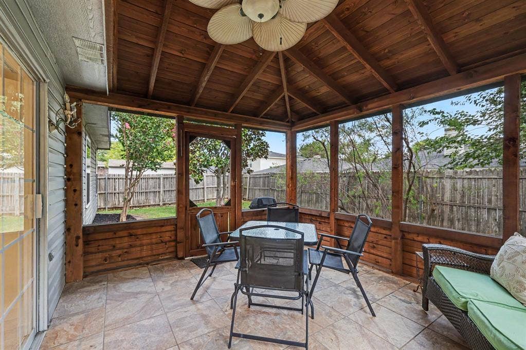 3123 Melrose Drive, McKinney, TX 75070 Screened in sunroom with tile flooring and ceiling fan