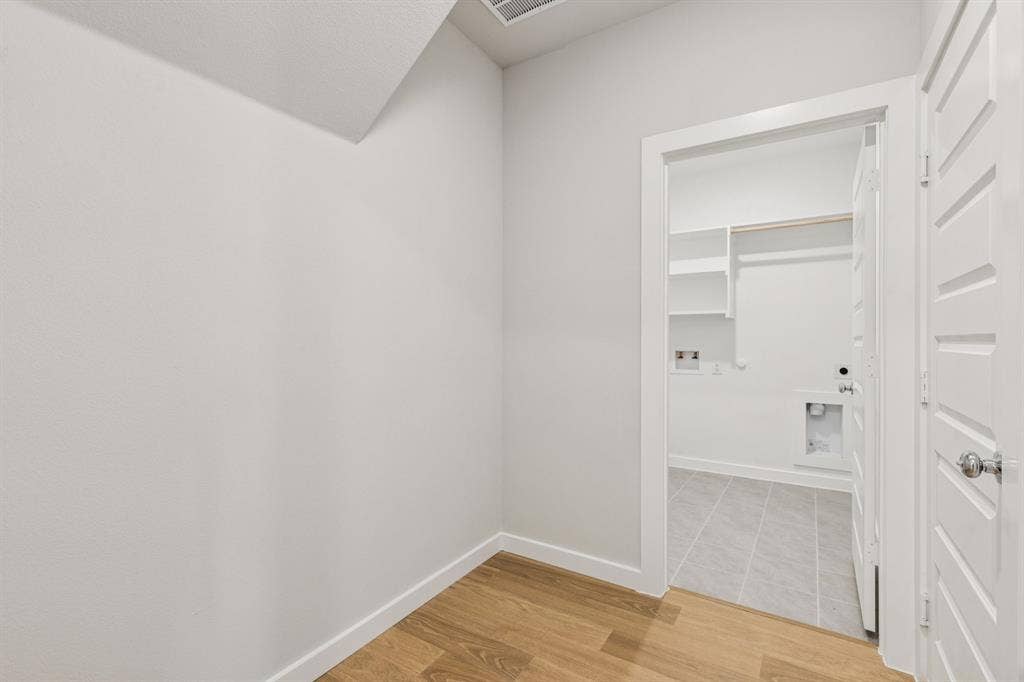 2120 Sunshining Road, Princeton, TX 75407 Utility Room in the Winters home plan by Trophy Signature Homes – REPRESENTATIVE PHOTO