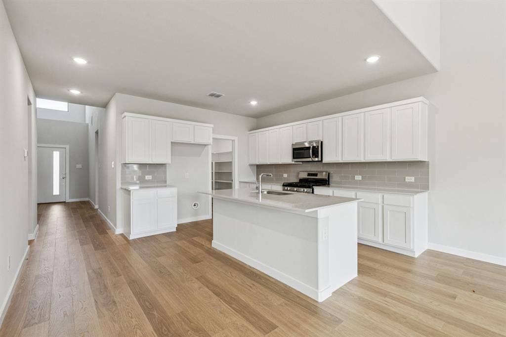 2120 Sunshining Road, Princeton, TX 75407 Kitchen in the Winters home plan by Trophy Signature Homes – REPRESENTATIVE PHOTO