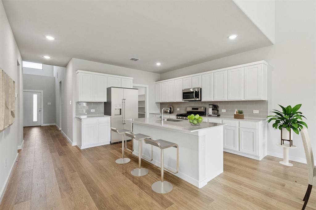 2120 Sunshining Road, Princeton, TX 75407 Kitchen in the Winters home plan by Trophy Signature Homes – REPRESENTATIVE PHOTO