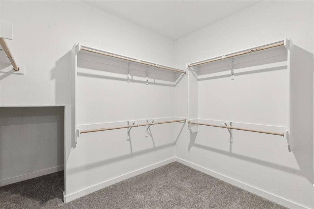 2120 Sunshining Road, Princeton, TX 75407 Primary Closet in the Winters home plan by Trophy Signature Homes – REPRESENTATIVE PHOTO