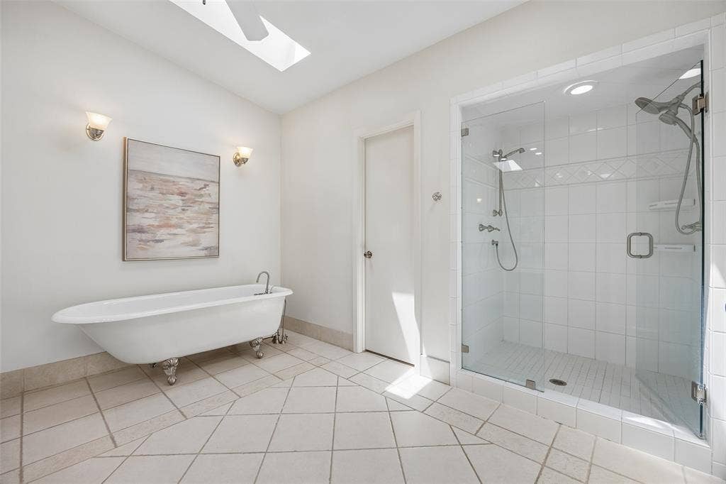 4110 Shady Hill Drive, Dallas, TX 75229 A second view of the primary bath highlights the spacious walk-in shower, dual shower heads and private water closet.