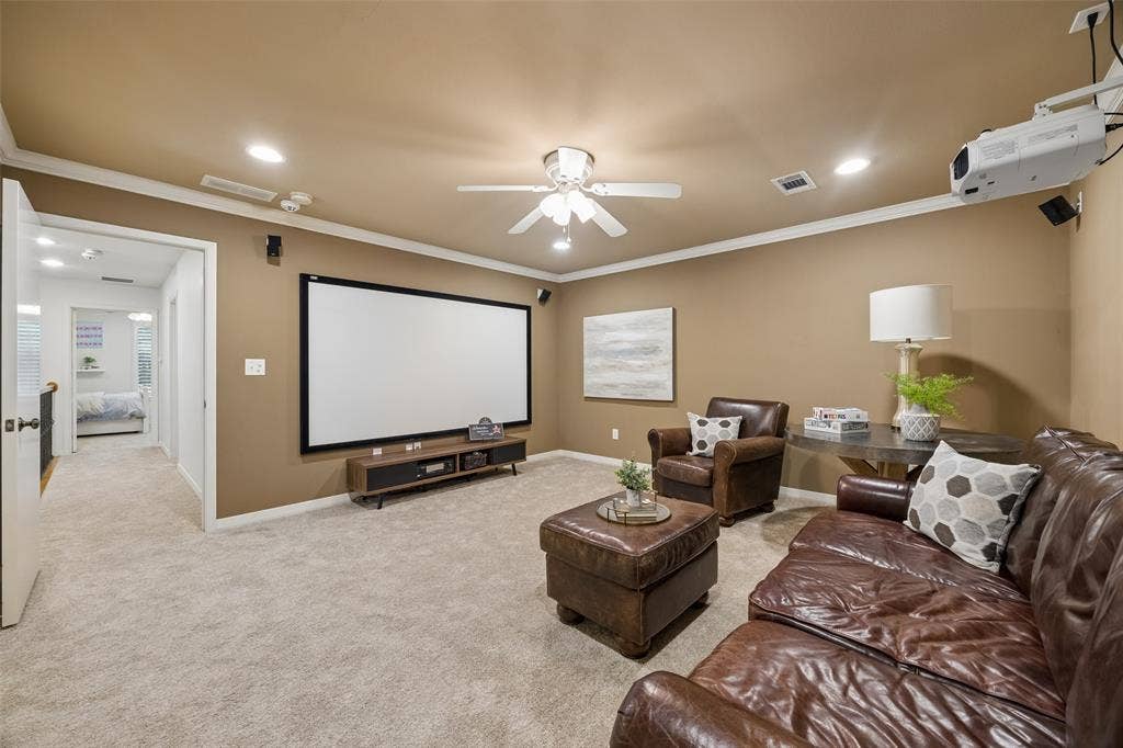 4110 Shady Hill Drive, Dallas, TX 75229 The upstairs media room with a large screen, surround sound, and plenty of space for movie nights or game-day viewing. Additional powder bath not photographed for guest.