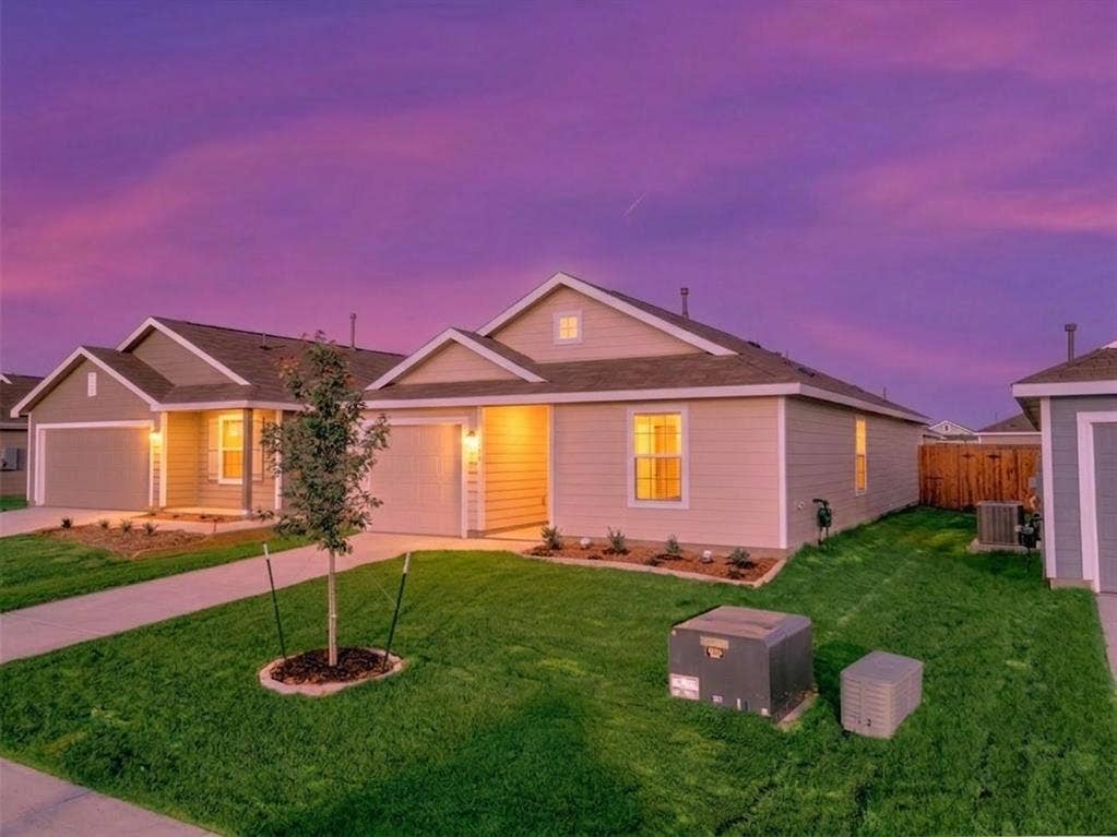 6005 Determine Lane, Forney, TX 75126 Single-story residence featuring light-colored siding and a covered entry