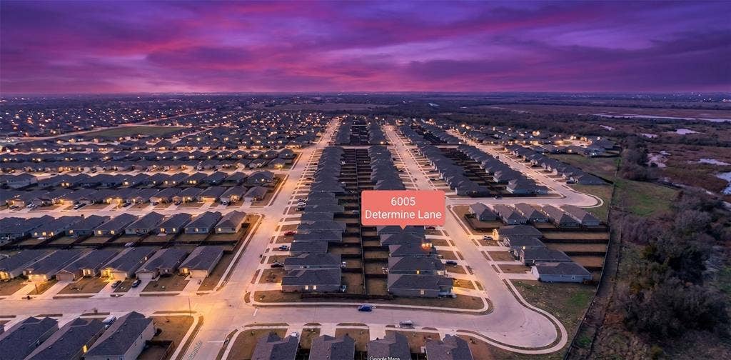 6005 Determine Lane, Forney, TX 75126 Planned residential community featuring uniformly styled homes with dark roofs and light exteriors