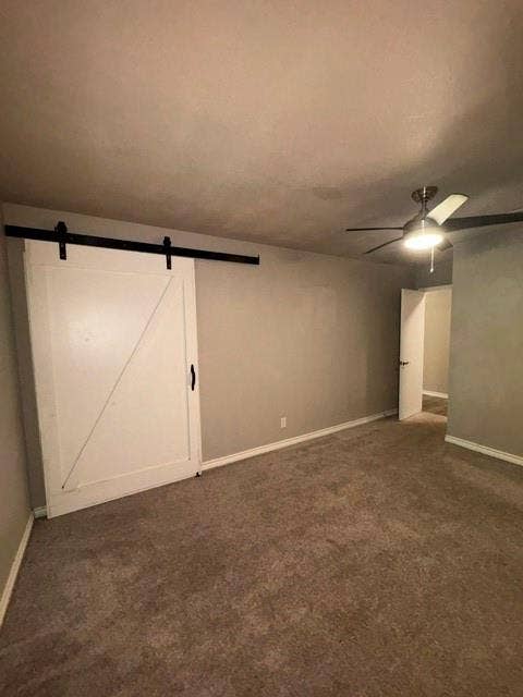 Secondary bedroom with barn door.