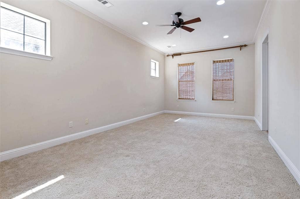 Expansive primary bedroom featuring a flexible layout and a bright, relaxing atmosphere.