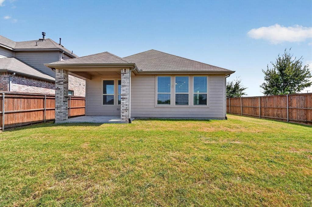 2832 Lolita Way, Forney, TX 75126 Spacious single-story residence featuring a brick and siding exterior with a hipped roof design