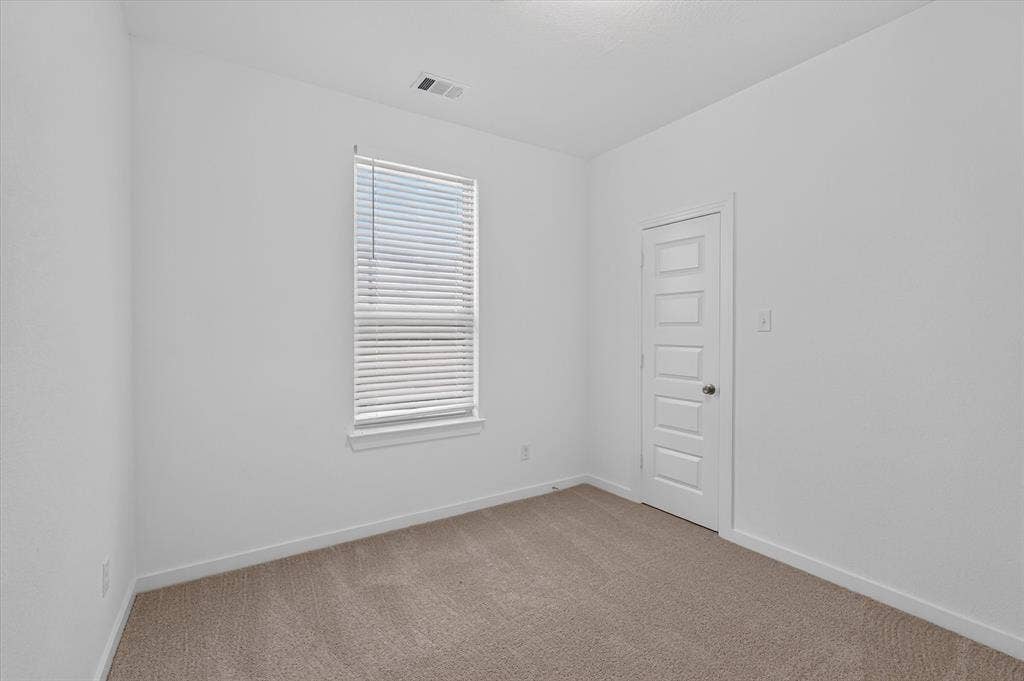 2832 Lolita Way, Forney, TX 75126 Neutral-toned carpeting complements the light wall finishes