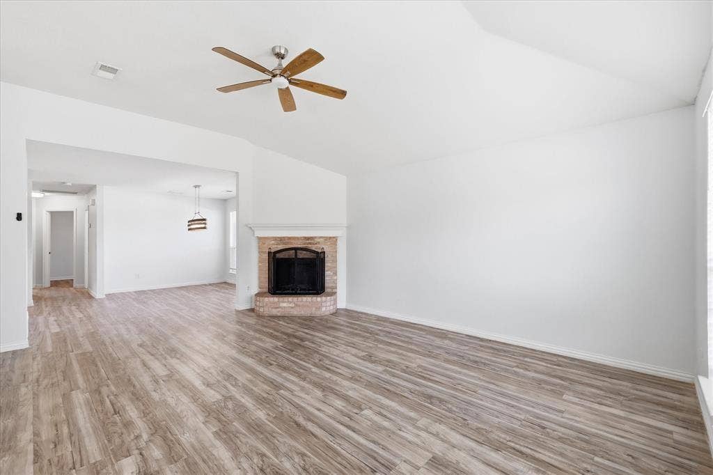 311 Bridlegate Drive, McKinney, TX 75069 Main living area with high ceilings, sized to comfortably fit a full sectional and coffee table.