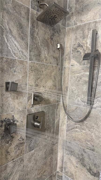 106 E Fairway Drive, Hideaway, TX 75771 Shower enclosure featuring large format stone-look tile