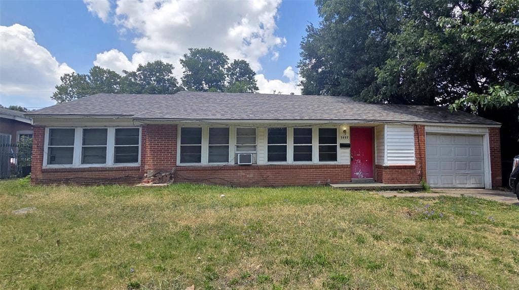 Brick and siding exterior with a shingle roof