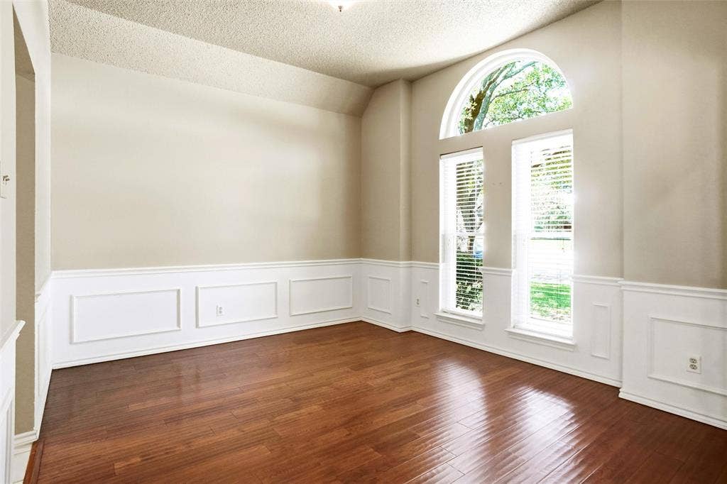 1321 Oak Harbor Boulevard, Azle, TX 76020 Separate Dining Room Love the attention to detail in the moldings, floor and windows!