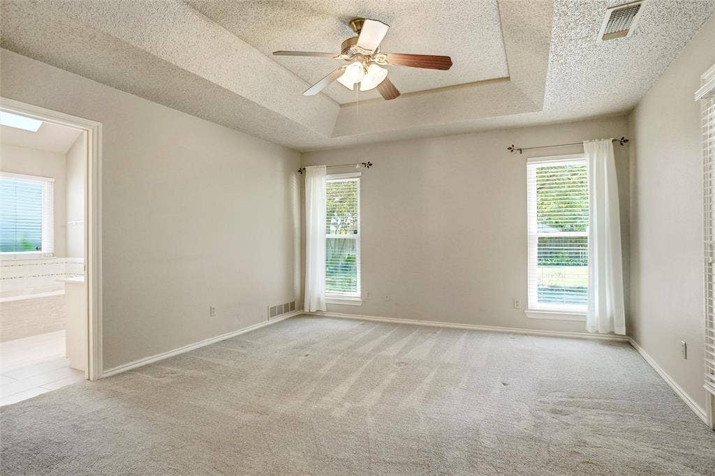 1321 Oak Harbor Boulevard, Azle, TX 76020 Primary bedroom with views of back yard