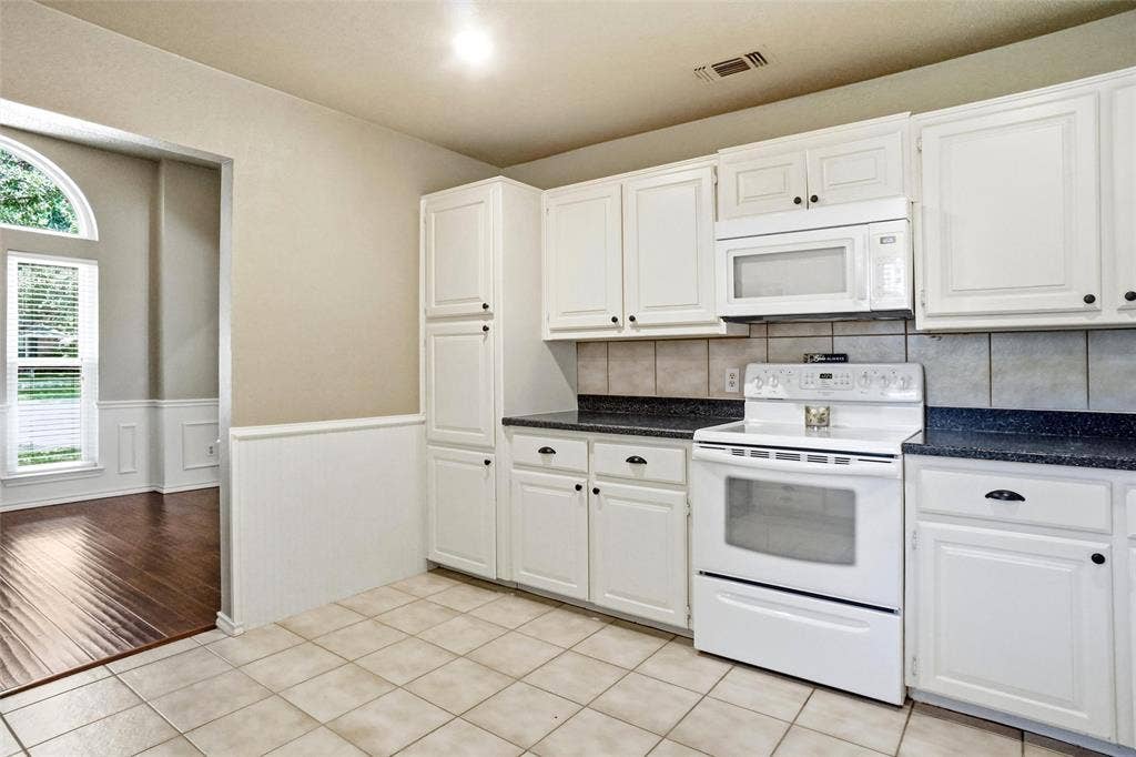 1321 Oak Harbor Boulevard, Azle, TX 76020 Lots of cabinets and storage