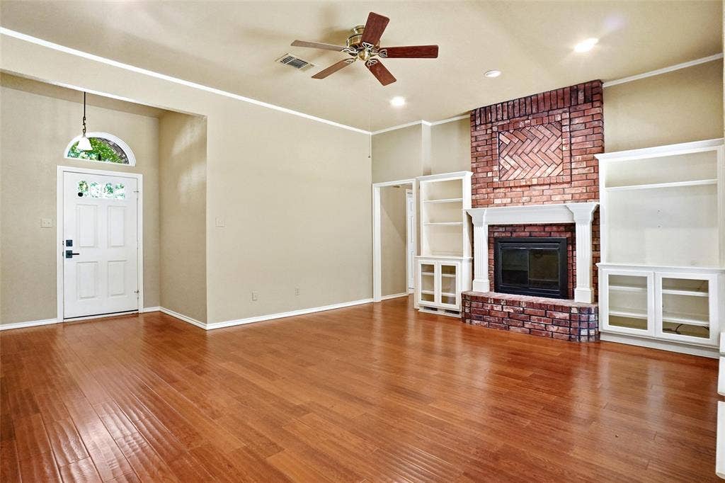 1321 Oak Harbor Boulevard, Azle, TX 76020 View of entry fireplace and built ins