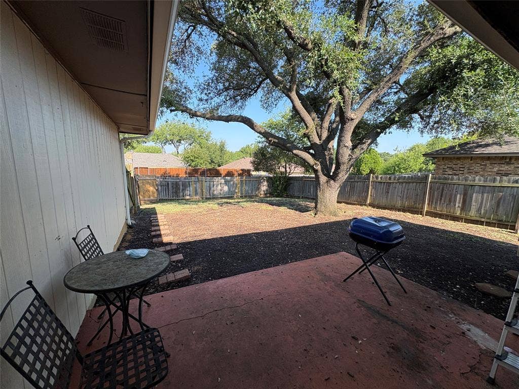 Large patio and fenced back yard