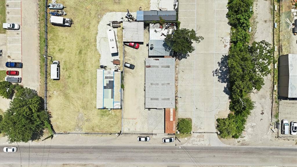 2136 California Crossing Road, Dallas, TX 75220 Expansive commercial property featuring a combination of paved and grass areas