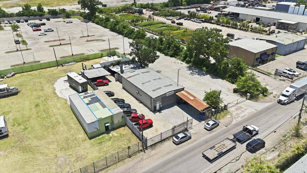 2136 California Crossing Road, Dallas, TX 75220 Expansive commercial property featuring multiple buildings, paved parking areas, and convenient road frontage