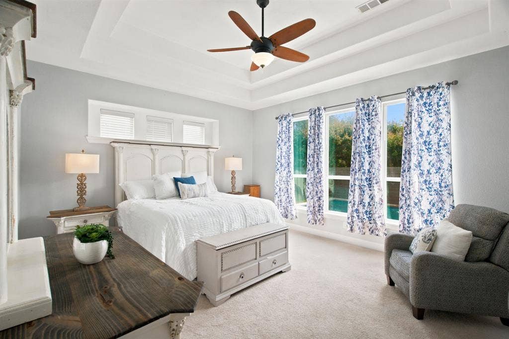 Primary bedroom brings in lots of natural light
