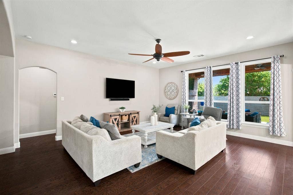 the living room is wonderful and overlooks your backyard