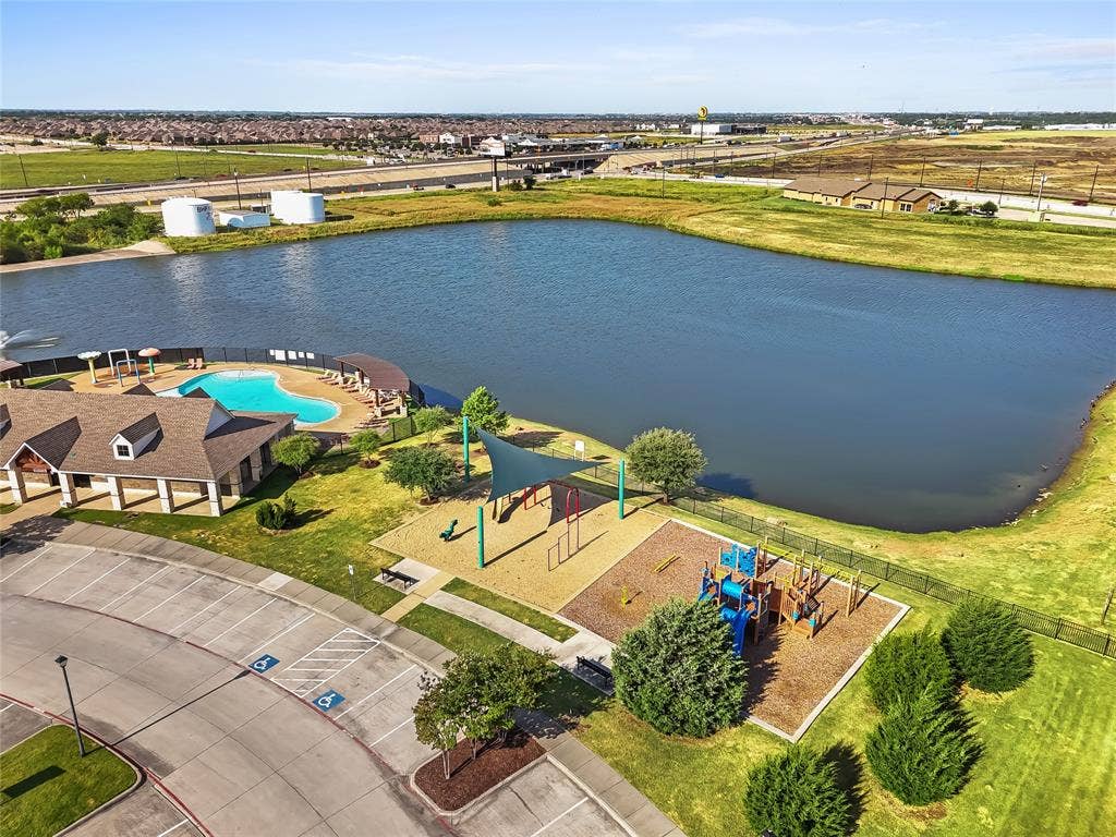 2920 Roper Street, Royse City, TX 75189 Expansive community lakefront area featuring a large, irregularly shaped body of water