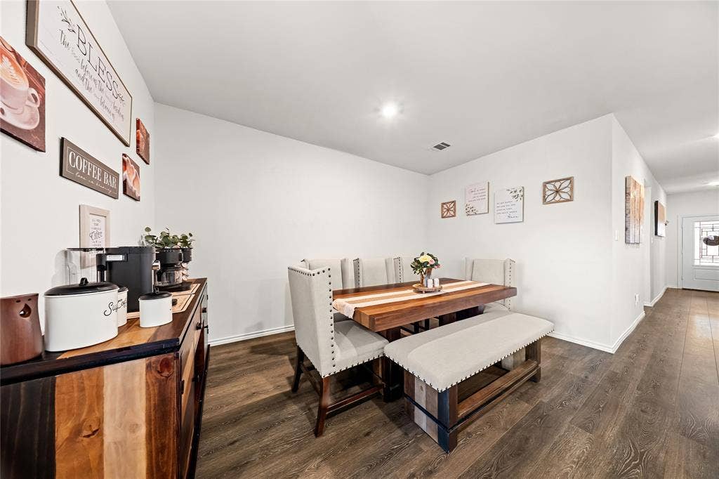 2920 Roper Street, Royse City, TX 75189 Dining area featuring wood-finish flooring, recessed lighting, and a white interior door with decorative glass