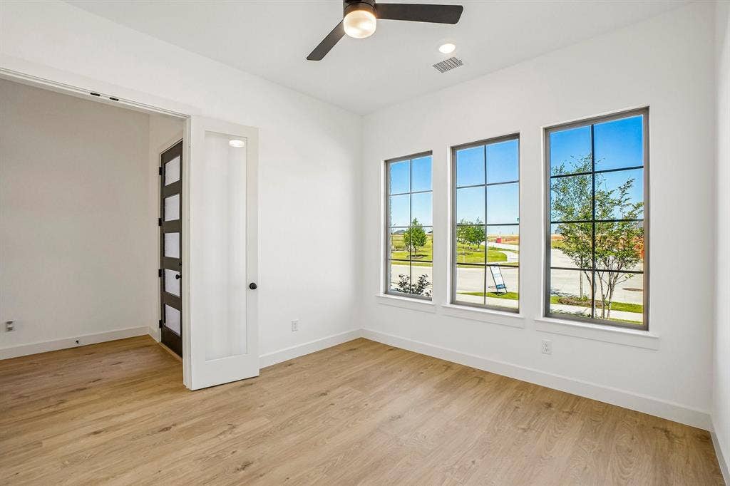 1516 Rose Mallow Road, Celina, TX 75009 The professional needing to work from home will appreciate this light, bright and private home office.