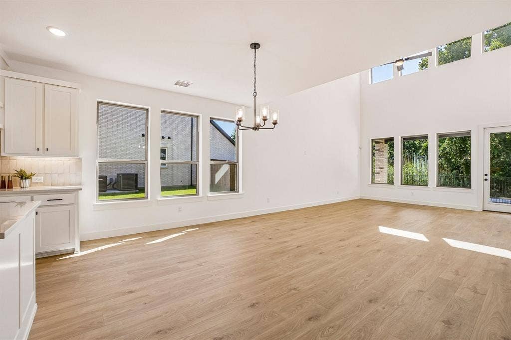 1516 Rose Mallow Road, Celina, TX 75009 Whether it's lively dinner parties or cozy family meals, this dining room fits all occasions!