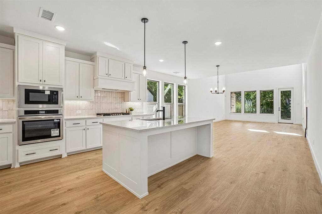 1516 Rose Mallow Road, Celina, TX 75009 All the chefs in the family will enjoy the storage and prep space offered in this over the top kitchen!